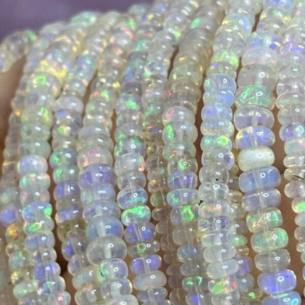 Fil de perles opale bleue semi-plates AAA